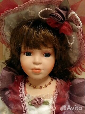 Фарфоровая коллекционная кукла Remeco