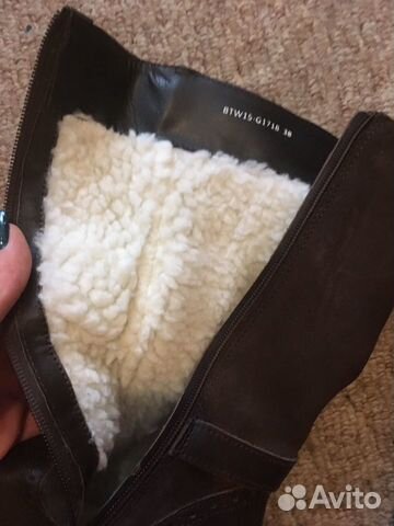 Новые кожаные сапоги