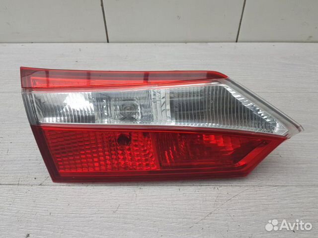 Фонарь в крышку левый Toyota Corolla E180 1ZR-FE