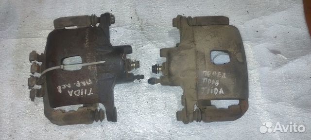 Суппорт тормозной левый, правый Nissan Tiida С11