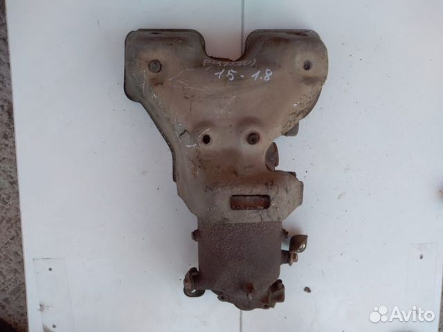 Выпускной коллектор с катализатором Nissan Primera