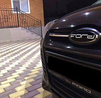 Наклейки на эмблемы Ford Focus