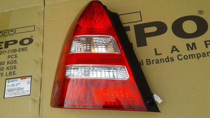 Subaru Forester SG фонарь левый новый 2002-2004