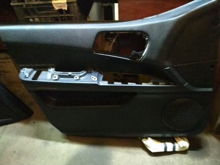 Обшивка двери водителя чёрная для Ssang Yong