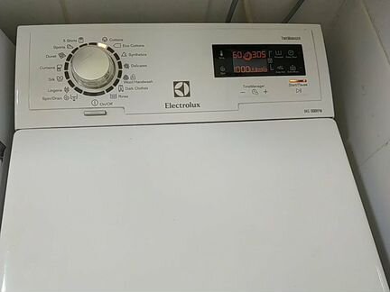 Electrolux 6 кг 1000 об. с вертикальной загрузкой